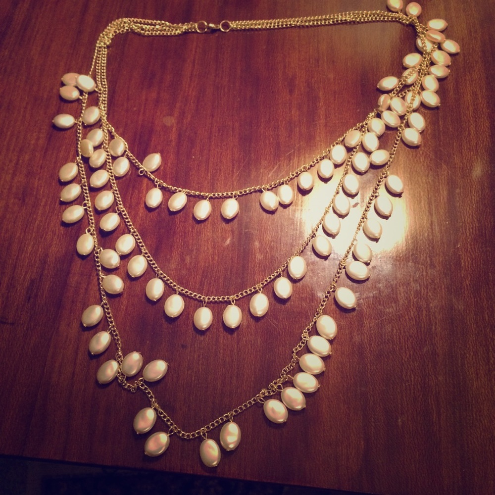 Three strand flat pearl necklace